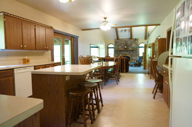 1760 East Burville Road Crete, IL 60417 - Photo 4 of 25 a kitchen with stainless steel appliances granite countertop a refrigerator a sink a stove and island