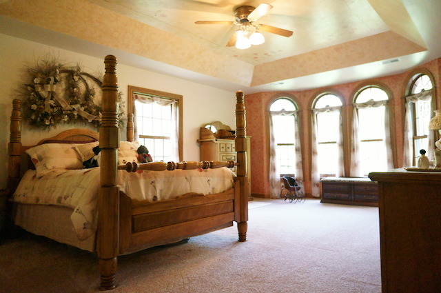 1760 East Burville Road Crete, IL 60417 - Photo 8 of 25 a bed room with a bed and a large window