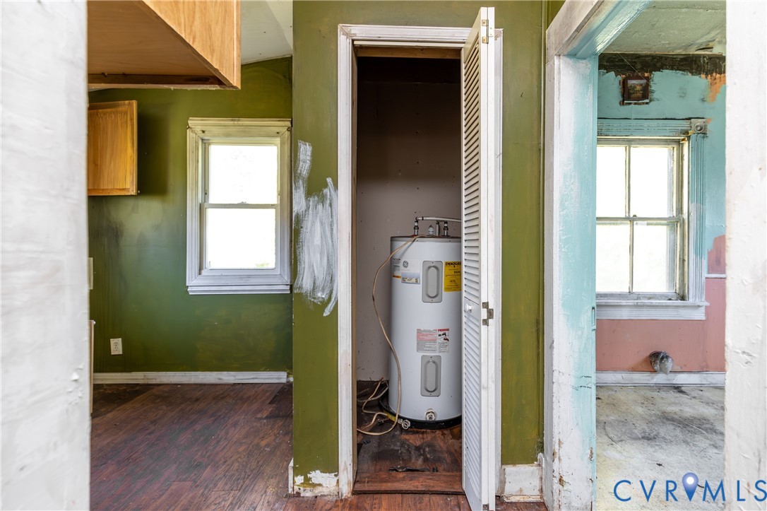 13512 Queen Street Disputanta, VA 23842 - Photo 16 of 46 a bathroom with a sink and a mirror