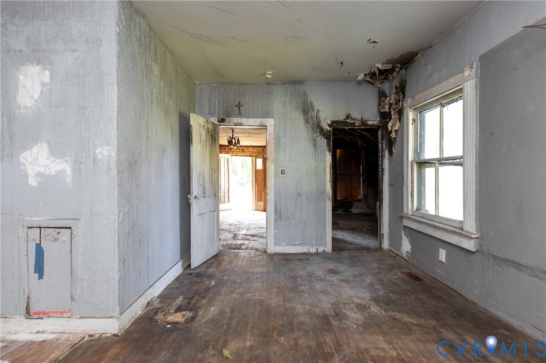 13512 Queen Street Disputanta, VA 23842 - Photo 19 of 46 a view of an empty room and a window
