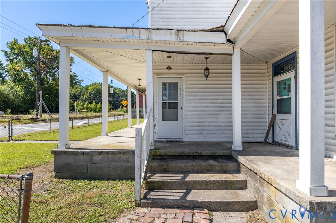 13512 Queen Street Disputanta, VA 23842 - Photo 23 of 46 a view of a house with pool and wooden floor