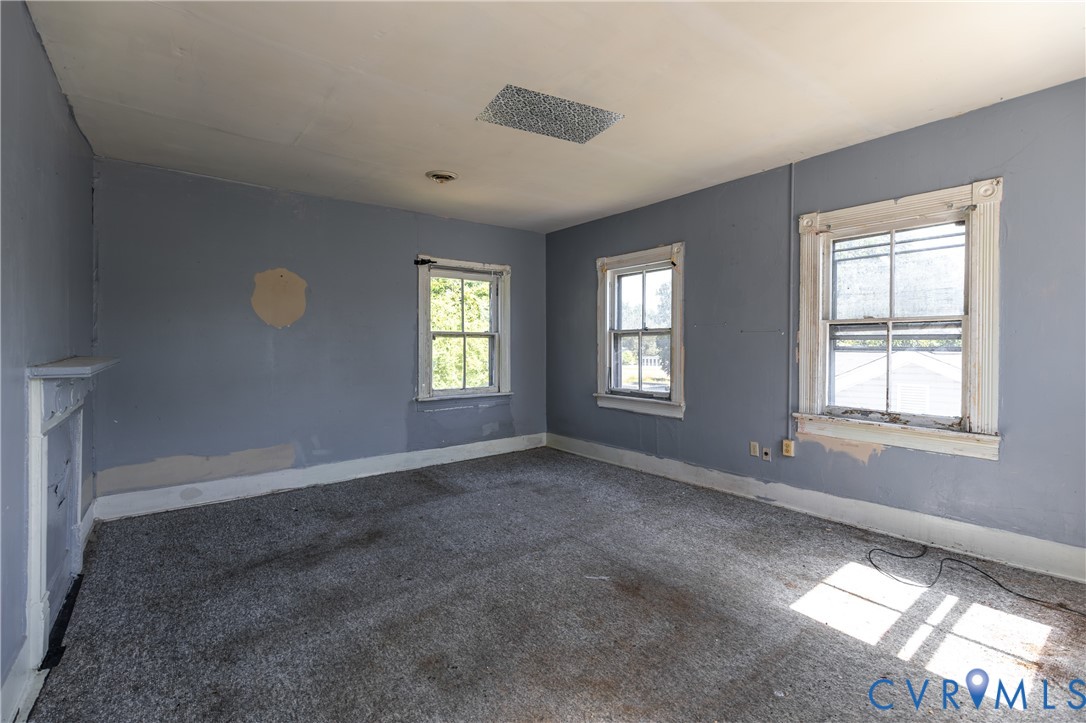 13512 Queen Street Disputanta, VA 23842 - Photo 27 of 46 a view of an empty room with a window