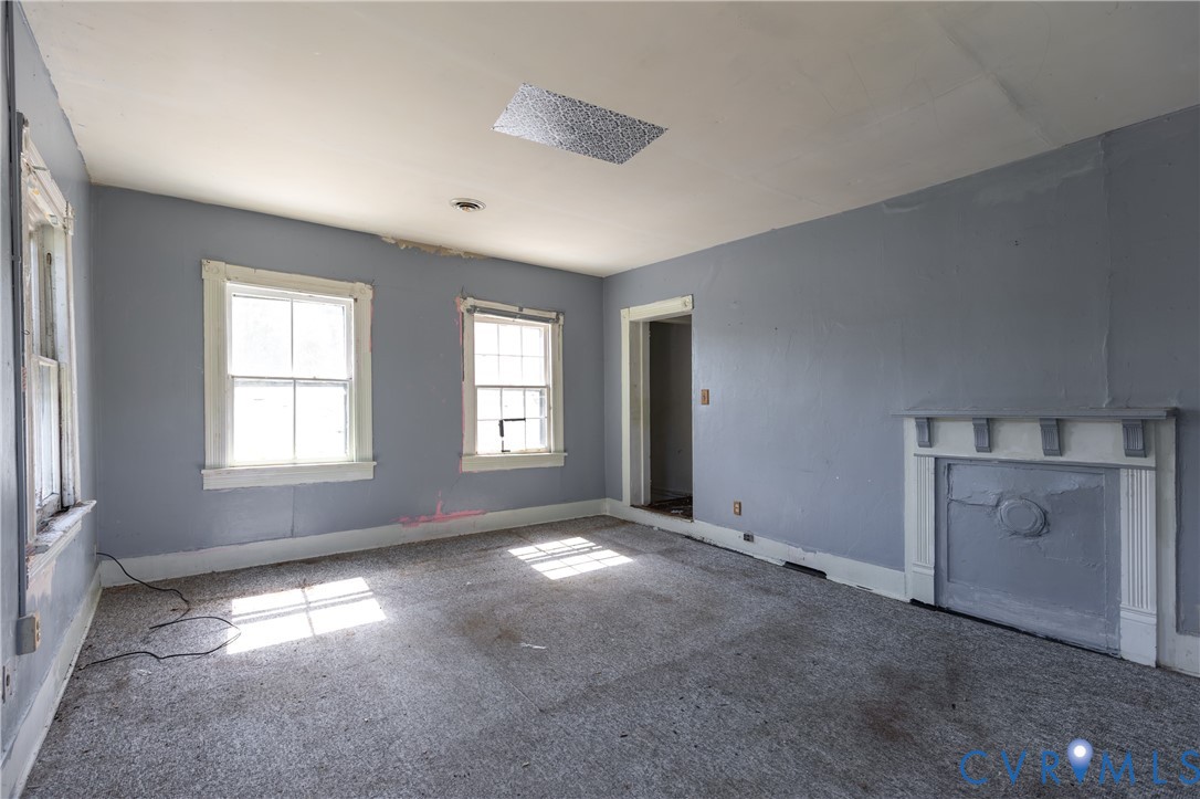 13512 Queen Street Disputanta, VA 23842 - Photo 29 of 46 a view of empty room with window