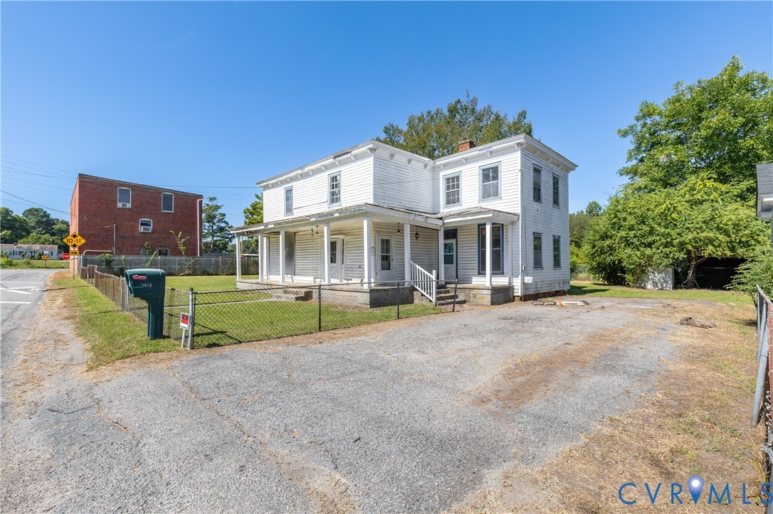 13512 Queen Street Disputanta, VA 23842 - Photo 3 of 46 a view of house with outdoor space and porch
