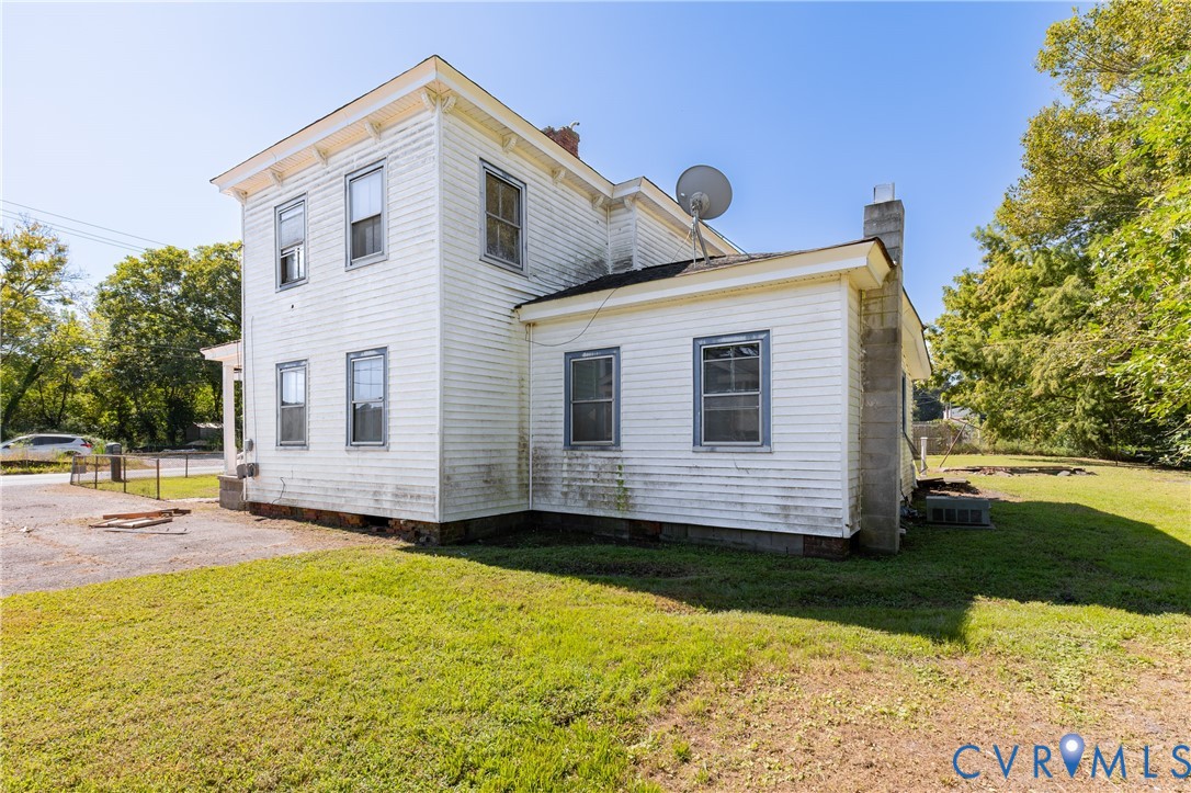 13512 Queen Street Disputanta, VA 23842 - Photo 42 of 46 a front view of a house with yard