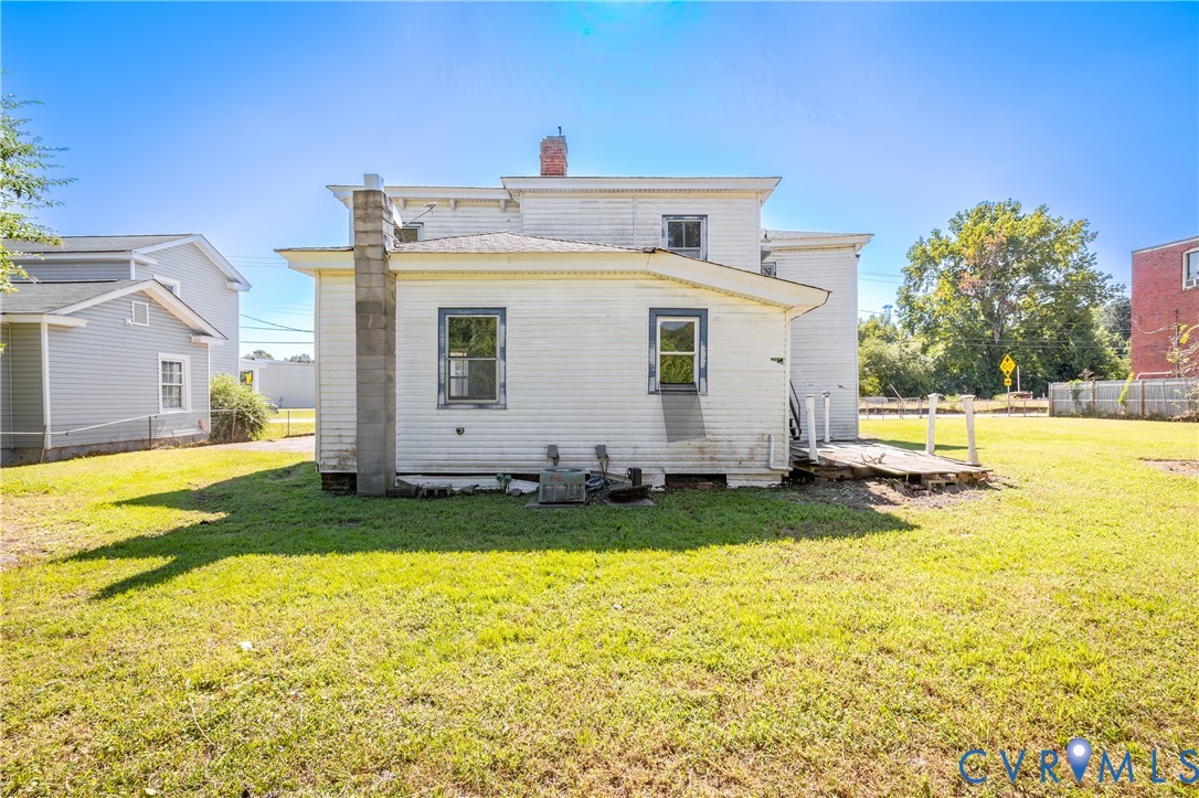 13512 Queen Street Disputanta, VA 23842 - Photo 44 of 46 a view of a house with a swimming pool
