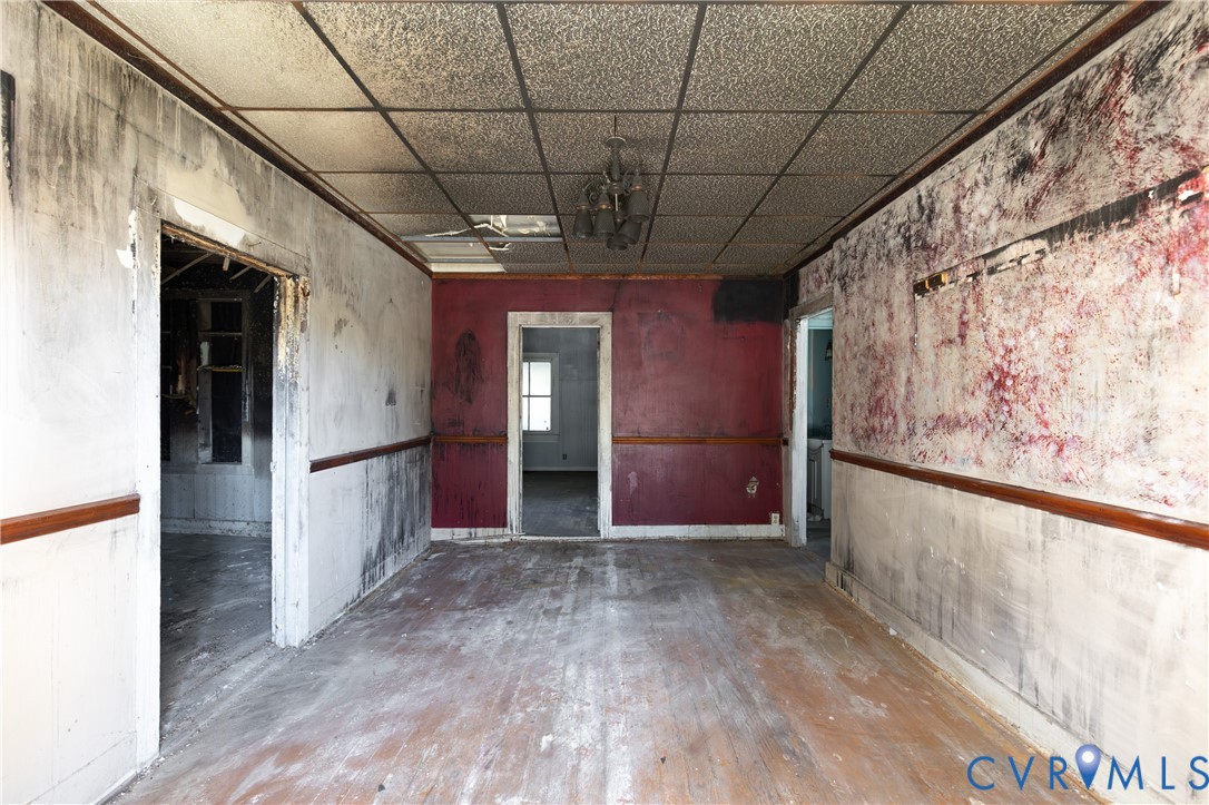 13512 Queen Street Disputanta, VA 23842 - Photo 5 of 46 a view of entryway with wooden floor