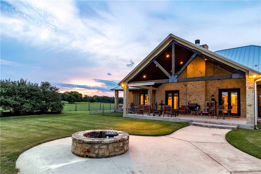 10285 Ferrill Creek Road Bryan, TX 77808 - Photo 43 of 44 a view of a house with a swimming pool
