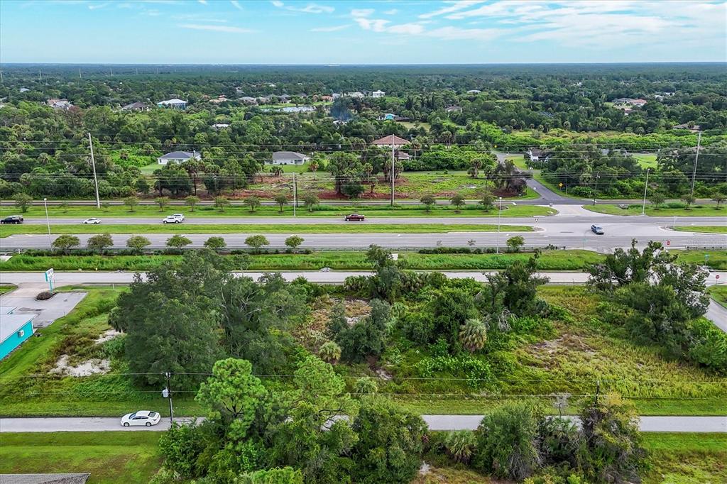 3285 South Access Road Englewood, FL 34224 - Photo 17 of 20 a view of a golf course with a park