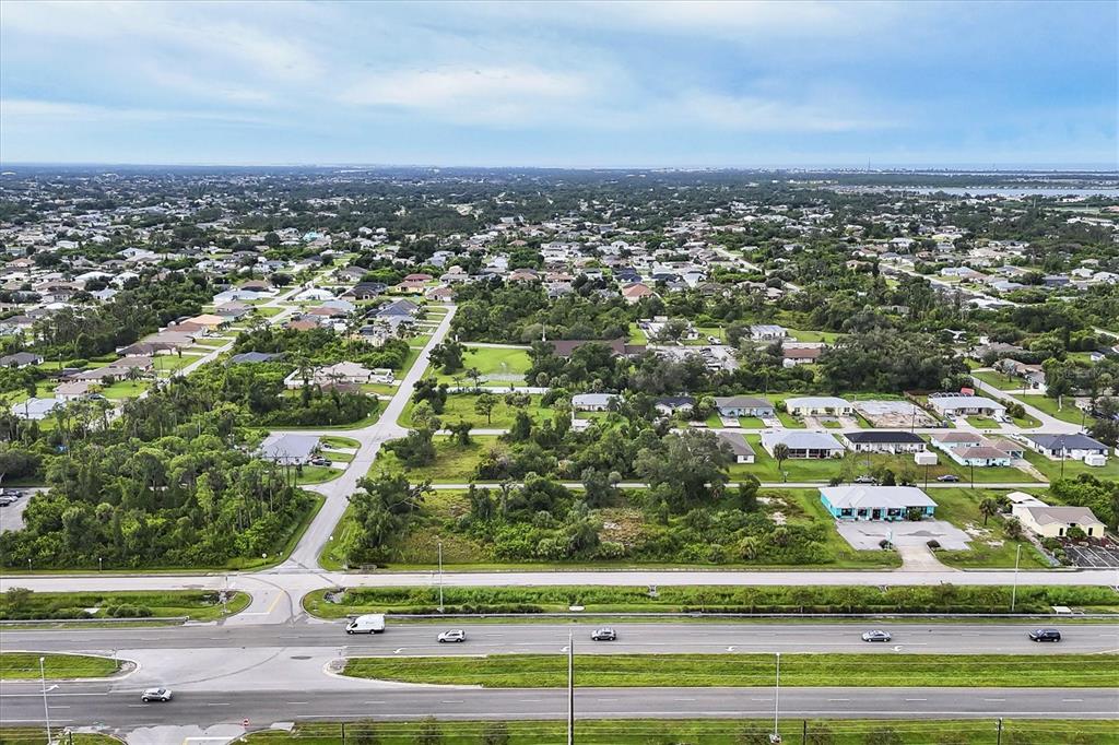 3285 South Access Road Englewood, FL 34224 - Photo 5 of 20 an aerial view of a city
