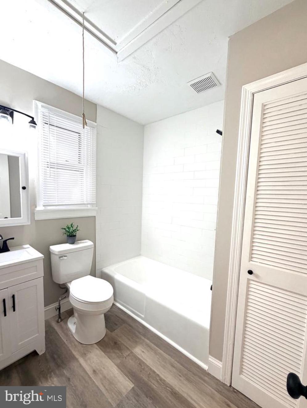 31 Mantua Road Mount Royal, NJ 08061 - Photo 10 of 11 a bathroom with a toilet a sink and a bathtub
