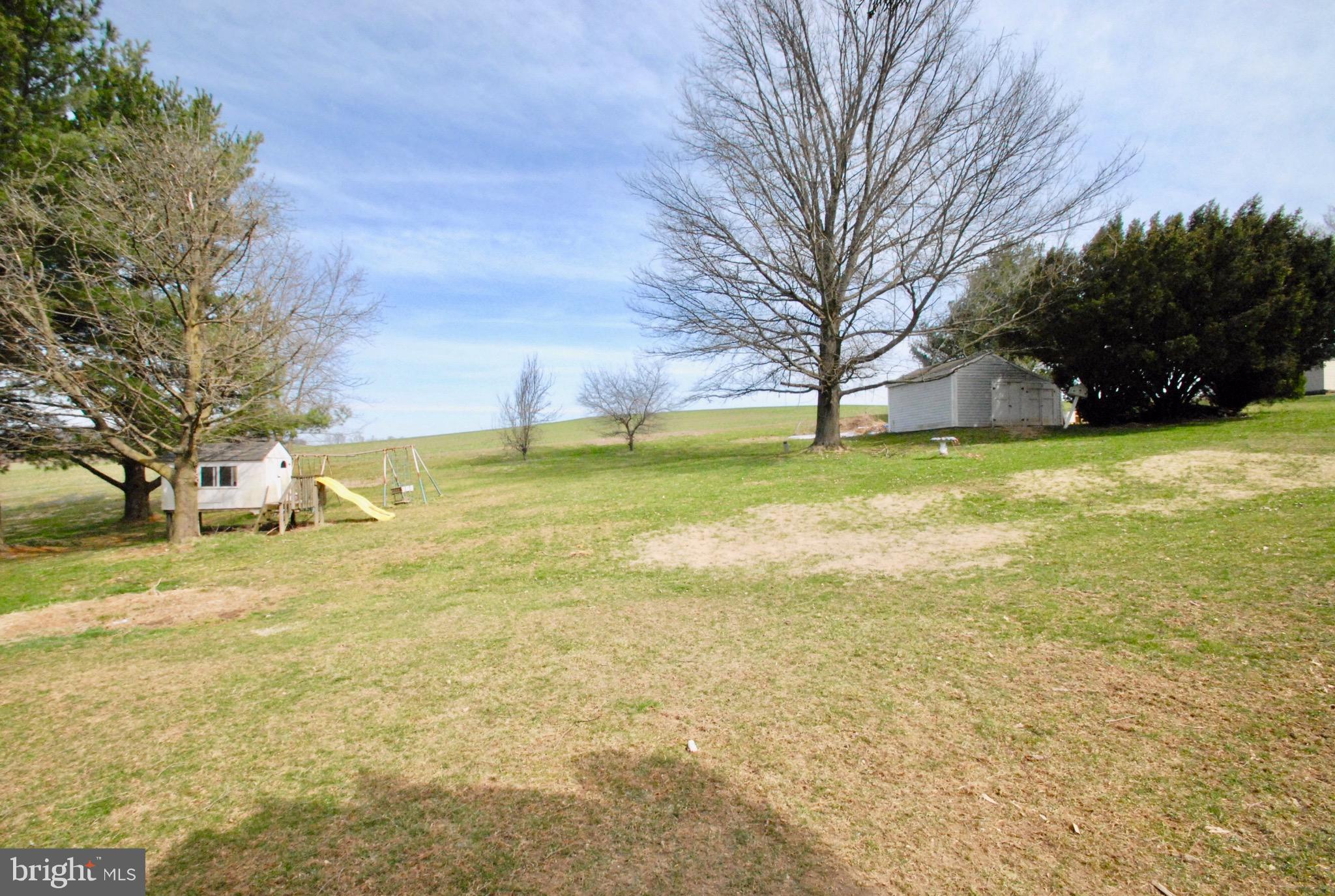235 Dull Road Felton, PA 17322 - Photo 3 of 29 a yard with a trees