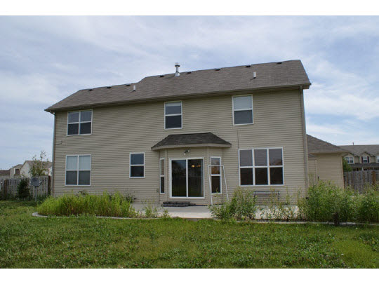 1446 Rock Island Road Davis Junction, IL 61020 - Photo 2 of 11 a view of outdoor space yard and front view of a house