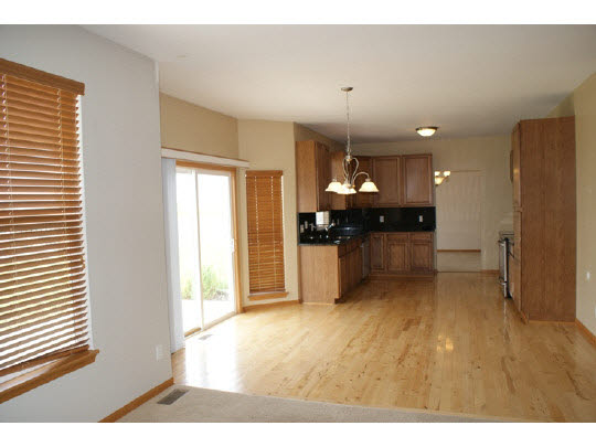 1446 Rock Island Road Davis Junction, IL 61020 - Photo 5 of 11 a view of a kitchen with a sink and a large window