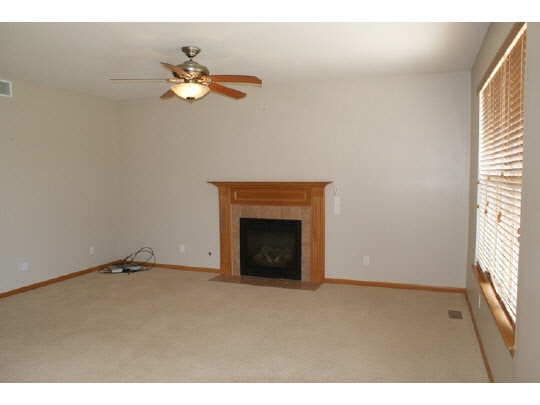 1446 Rock Island Road Davis Junction, IL 61020 - Photo 6 of 11 a view of an empty room with a window