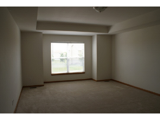 1446 Rock Island Road Davis Junction, IL 61020 - Photo 8 of 11 a view of an empty room with a window
