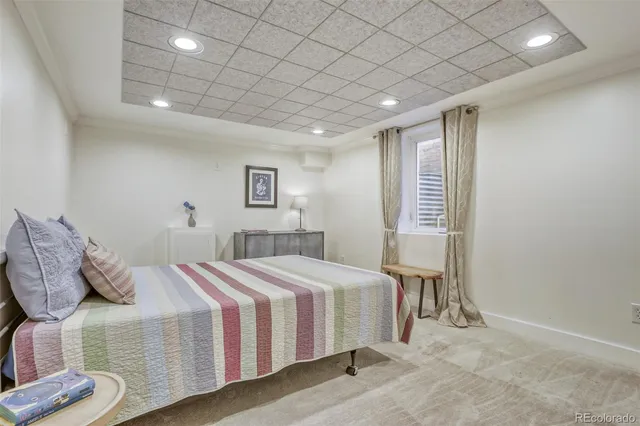 a bedroom with a bed and a table