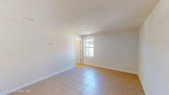 a view of empty room with window