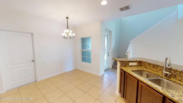 a bathroom with a sink a vanity and a mirror