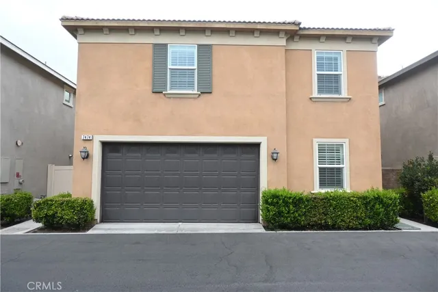 a view of a street with a bench and a fire pit