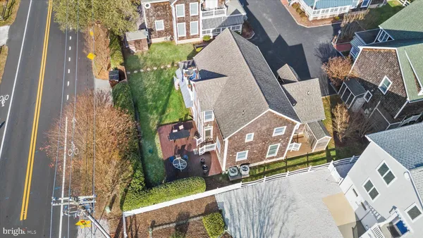 an aerial view of a house with a garden