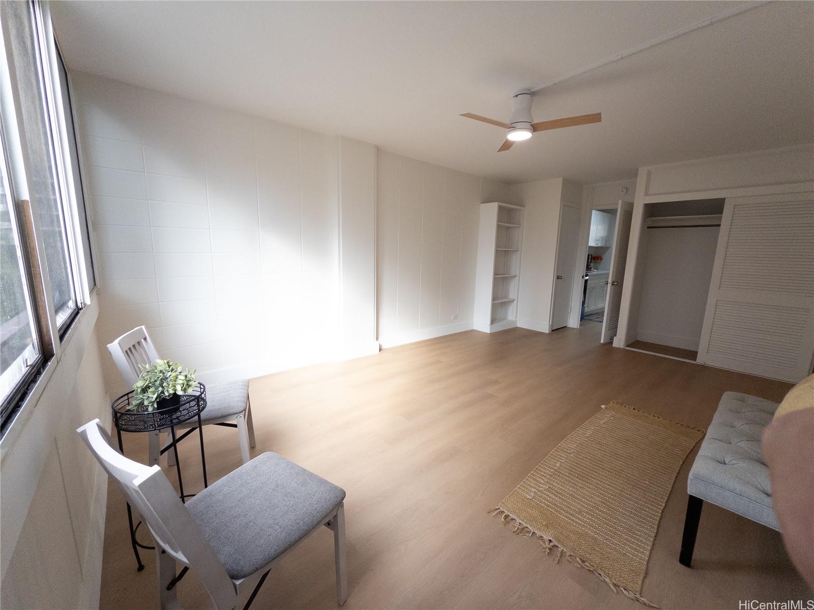 425 Ena Road, Unit 607C Honolulu, HI 96815 - Photo 12 of 21 a workspace with furniture and window