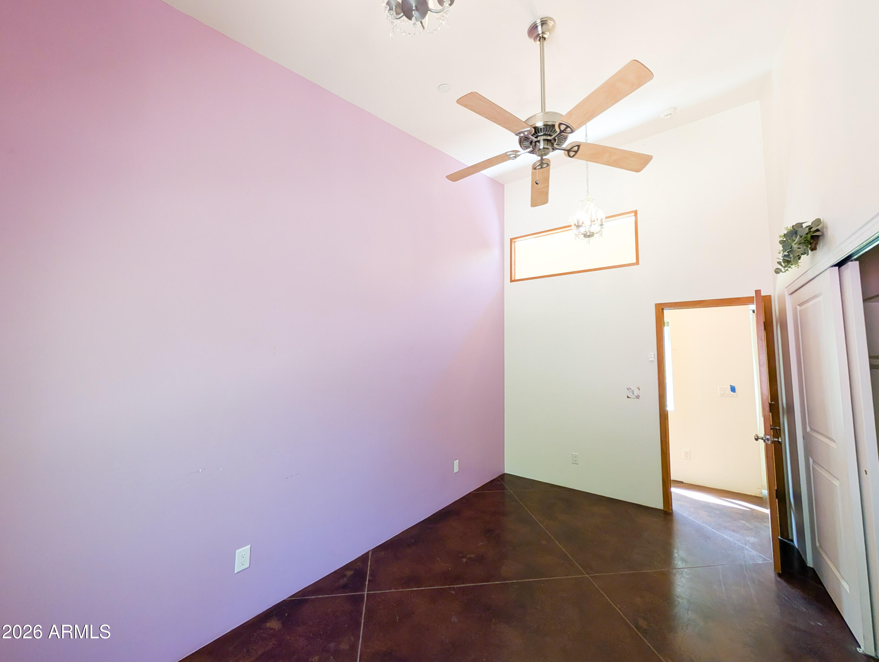 1165 North Willard Road Cottonwood, AZ 86326 - Photo 30 of 122 a view of a hallway with a ceiling fan and wooden floor