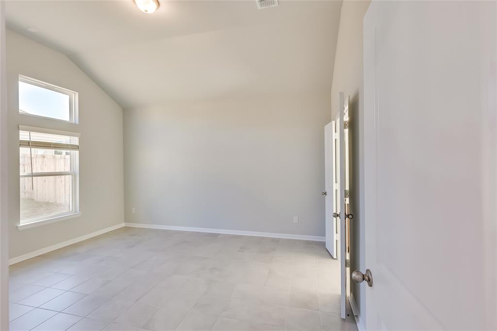 325 Diamondleaf Drive Buda, TX 78610 - Photo 12 of 29 an empty room with windows and closet