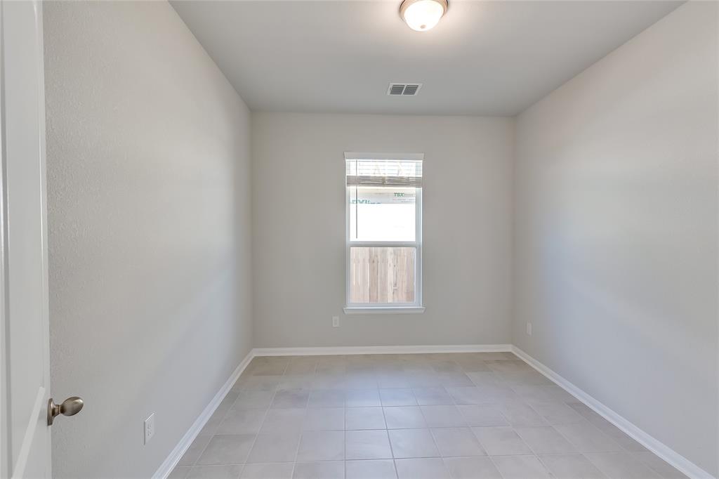 325 Diamondleaf Drive Buda, TX 78610 - Photo 20 of 29 an empty room with a window