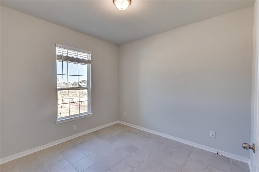 325 Diamondleaf Drive Buda, TX 78610 - Photo 21 of 29 an empty room with a window