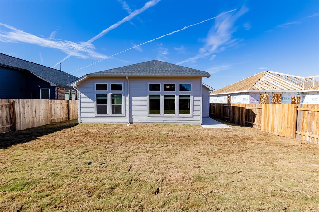 325 Diamondleaf Drive Buda, TX 78610 - Photo 23 of 29 a house with yard in front of it