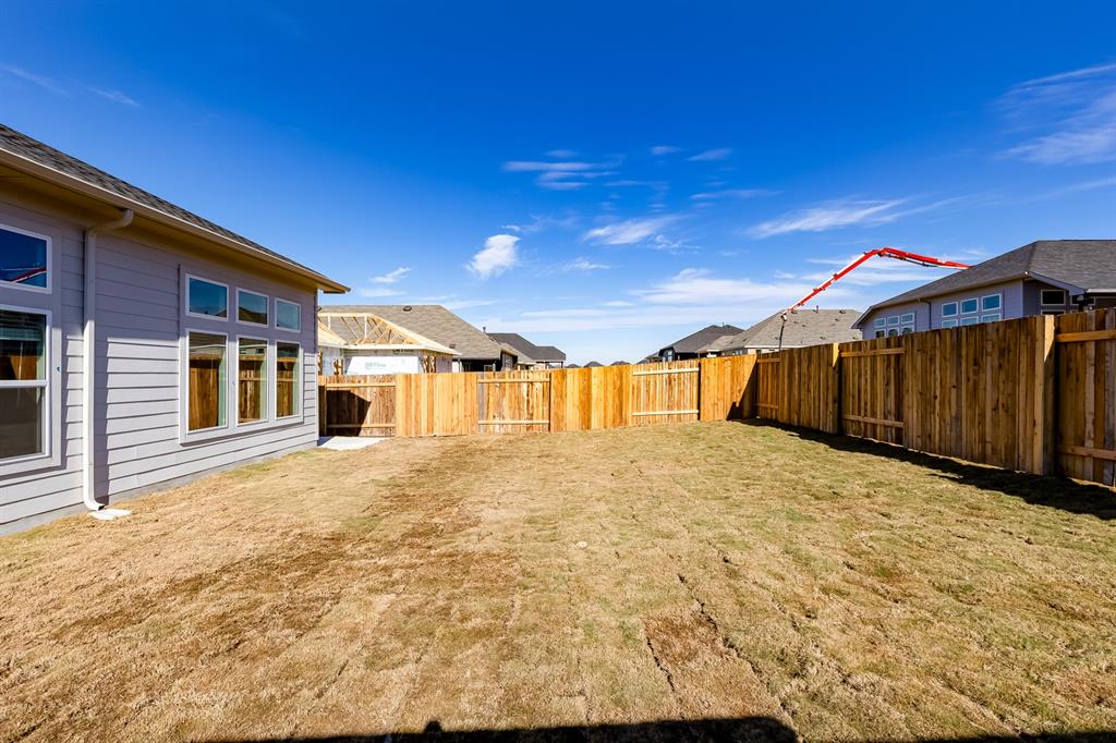 325 Diamondleaf Drive Buda, TX 78610 - Photo 25 of 29 a view of a house with a outdoor space