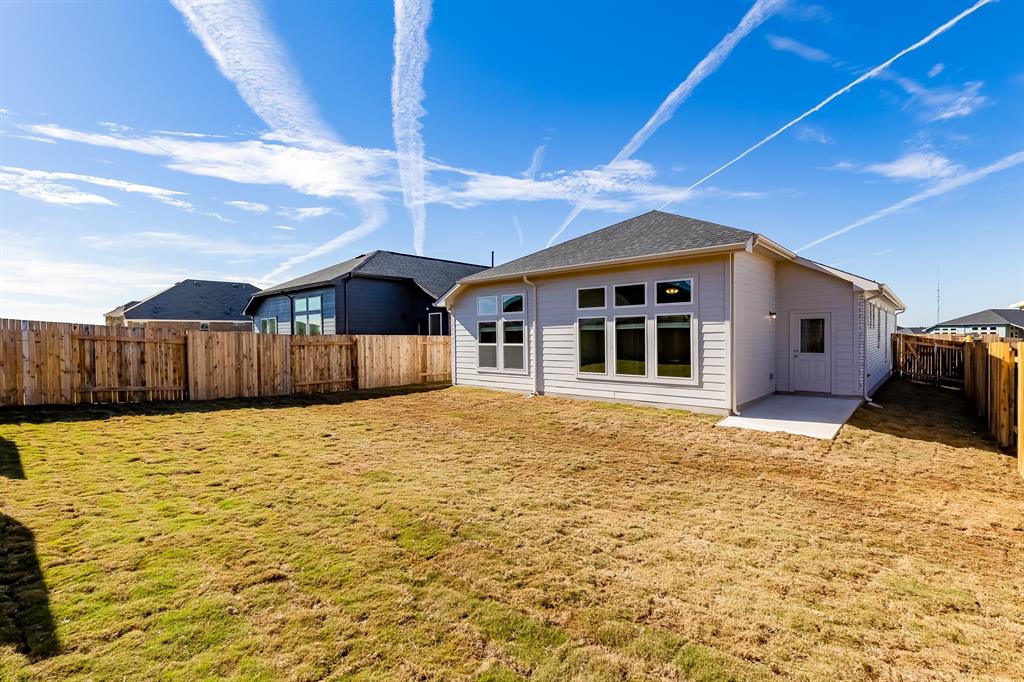 325 Diamondleaf Drive Buda, TX 78610 - Photo 26 of 29 a house with wooden fence