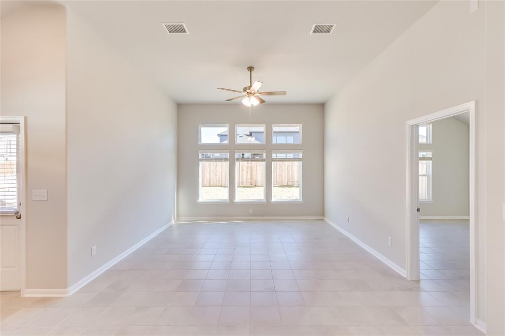 325 Diamondleaf Drive Buda, TX 78610 - Photo 6 of 29 a view of an empty room with a window