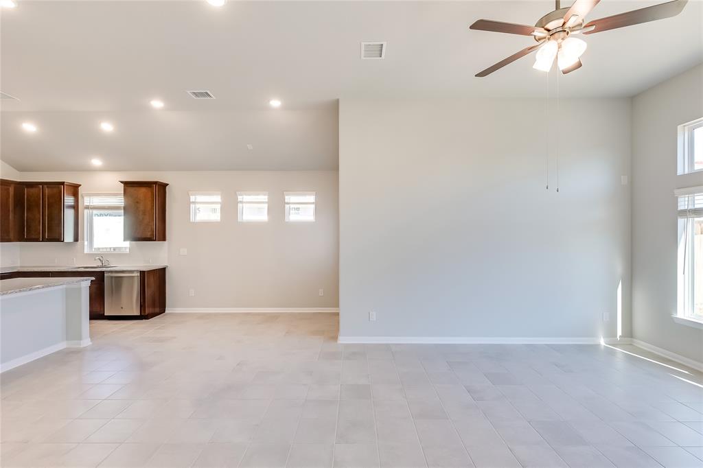 325 Diamondleaf Drive Buda, TX 78610 - Photo 29 of 29 a view of a kitchen with a sink and dishwasher kitchen view
