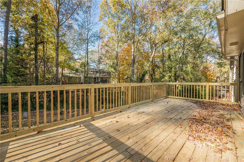 4147 Scofield Place Stone Mountain, GA 30083 - Photo 52 of 56 a view of a wooden roof deck