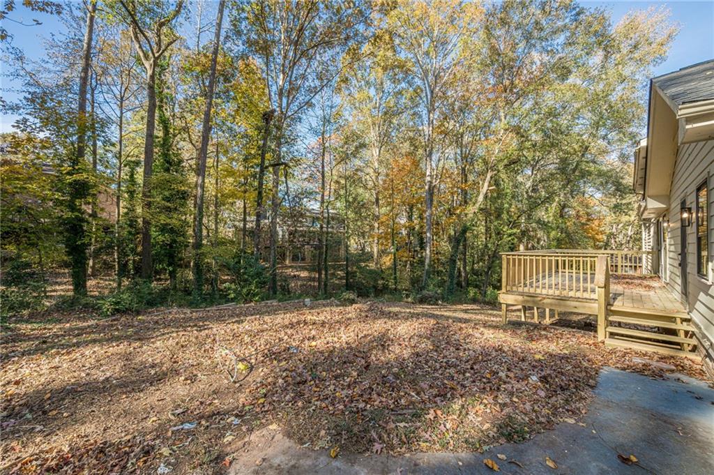 4147 Scofield Place Stone Mountain, GA 30083 - Photo 54 of 56 a view of outdoor space with deck and yard