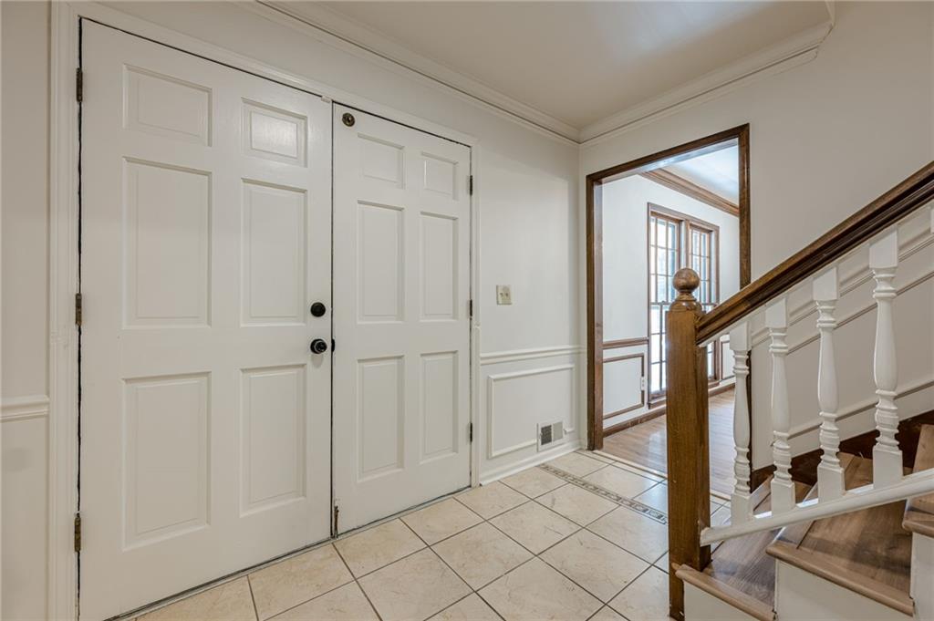 4147 Scofield Place Stone Mountain, GA 30083 - Photo 7 of 56 a view of an entryway with livingroom