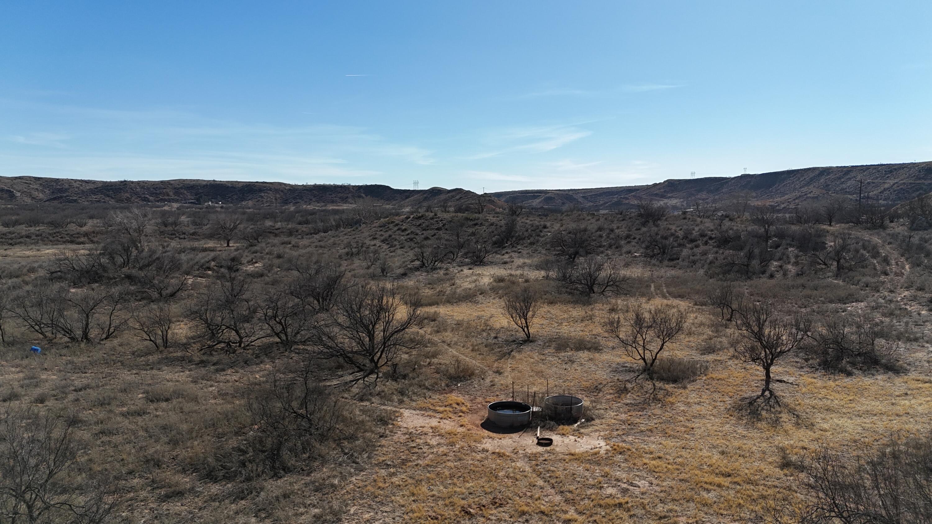 Petit Road Sanford, TX 79078 - Photo 9 of 14 a view of a dry field with mountains in the background