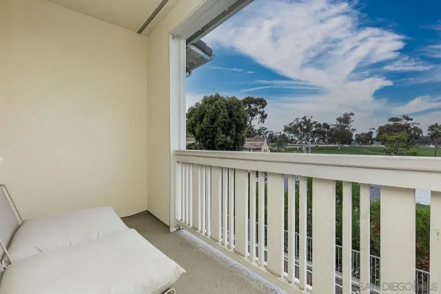 a view of a balcony with an outdoor space