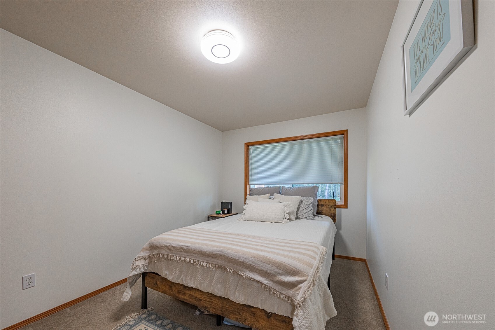 30608 40th Avenue East Graham, WA 98338 - Photo 18 of 30 a bedroom with a bed and a window