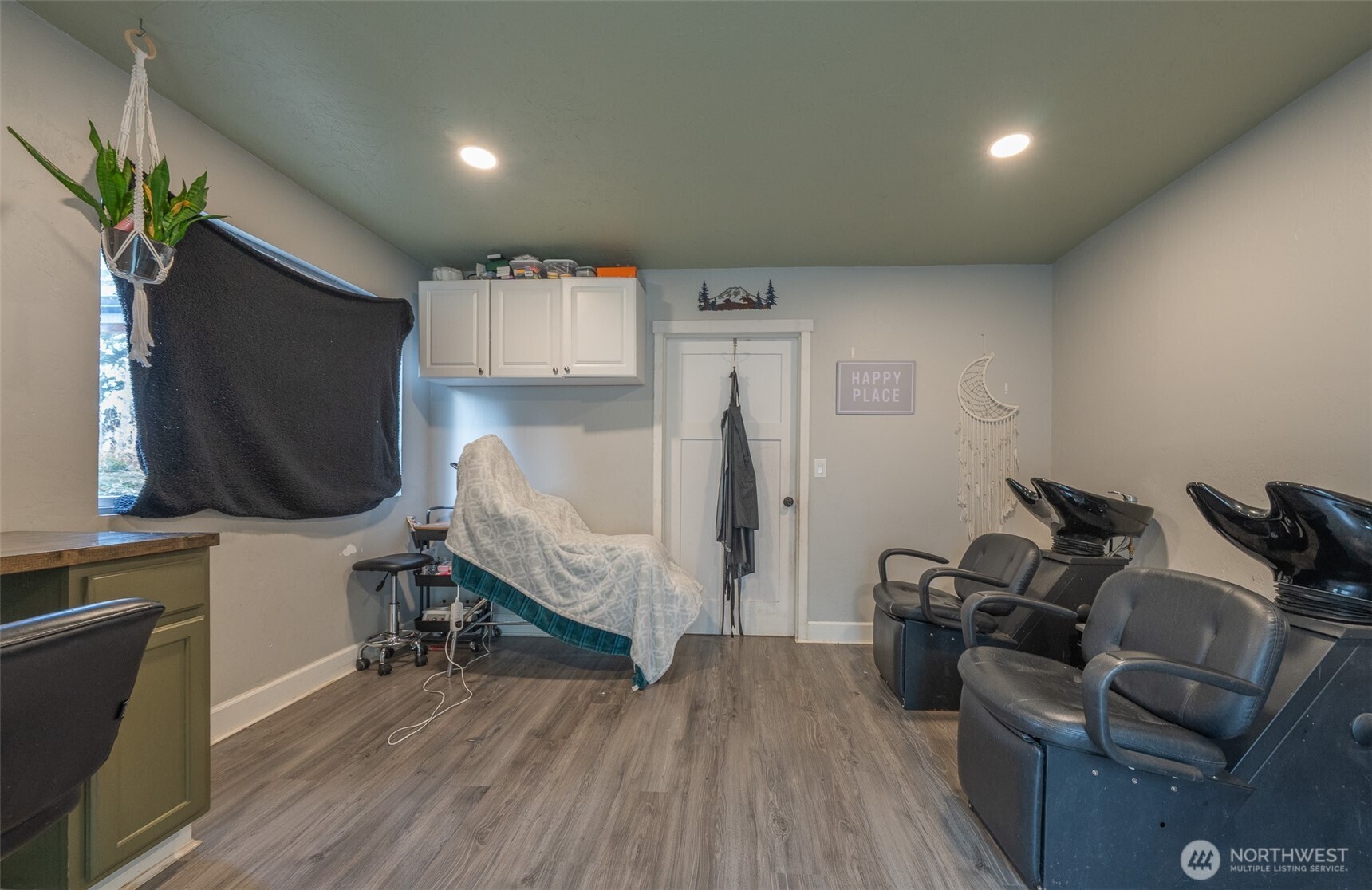 30608 40th Avenue East Graham, WA 98338 - Photo 22 of 30 a living room with furniture and a flat screen tv