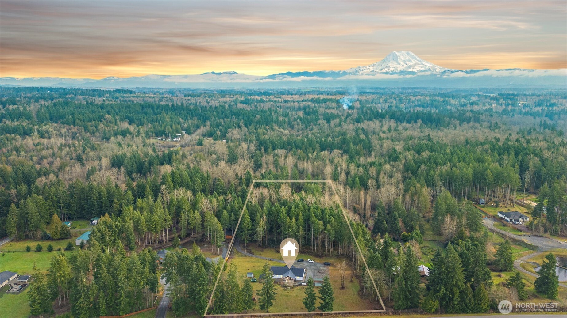 30608 40th Avenue East Graham, WA 98338 - Photo 5 of 30 a view of a city and lush green forest