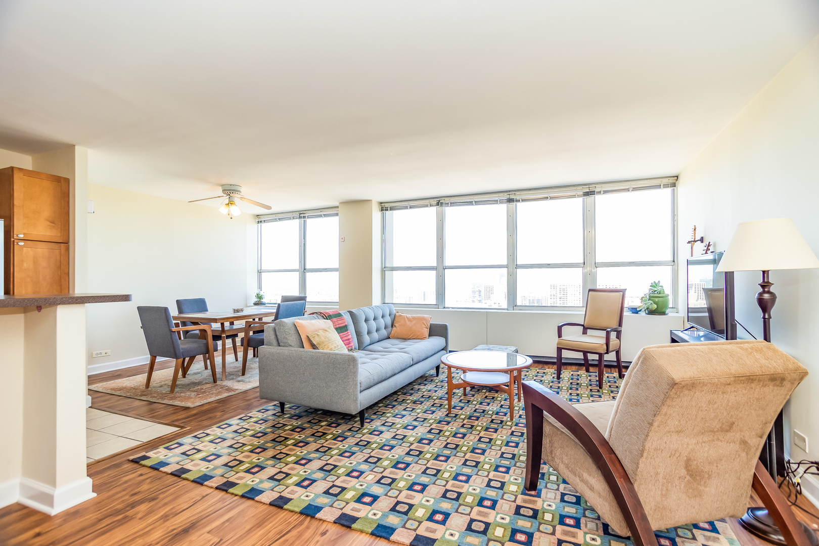655 West Irving Park Road, Unit 3012 Chicago, IL 60613 - Photo 4 of 24 a living room with furniture and a window