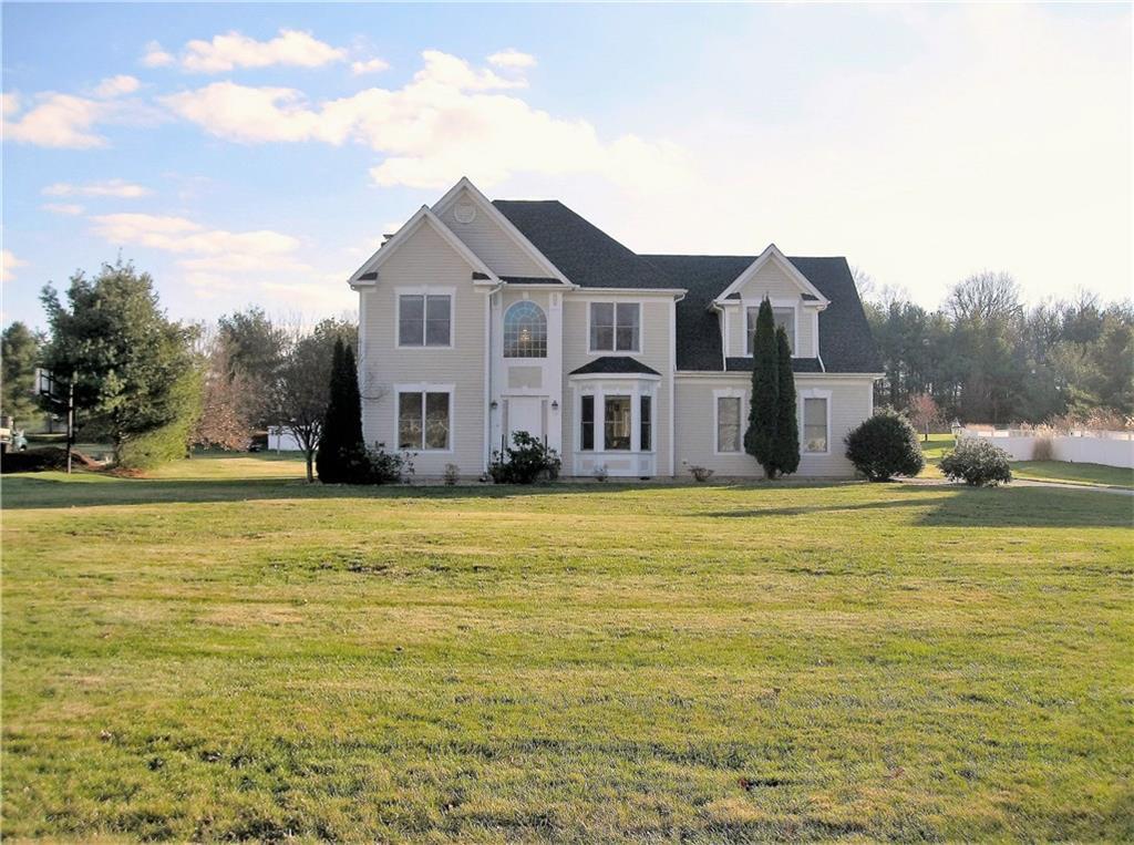 30 Taylor Town Road Glastonbury, CT 06073 - Photo 1 of 1 a front view of a house with a yard