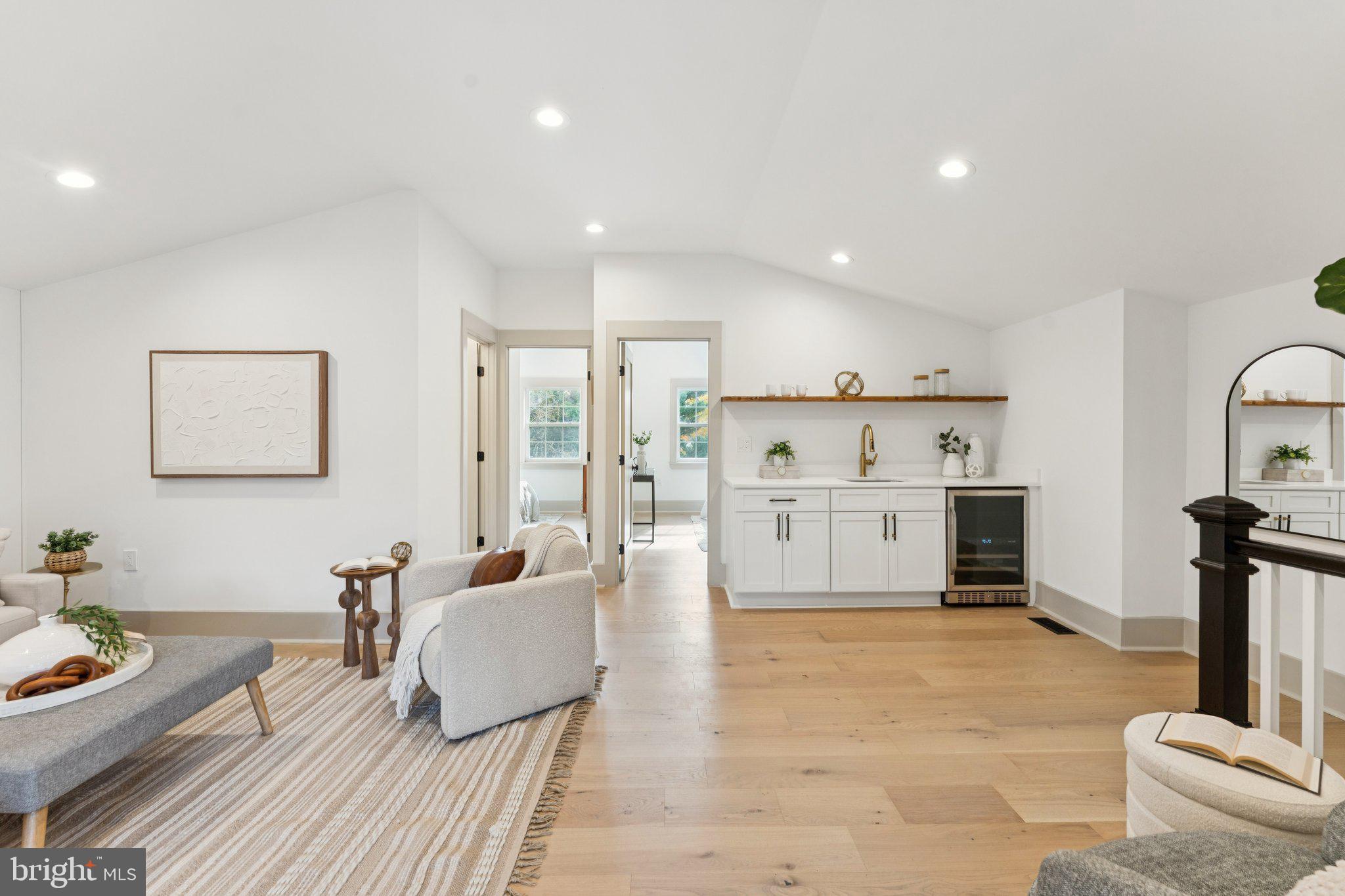 3216 Patterson Street Northwest Washington, DC 20015 - Photo 24 of 34 a living room with furniture and a table