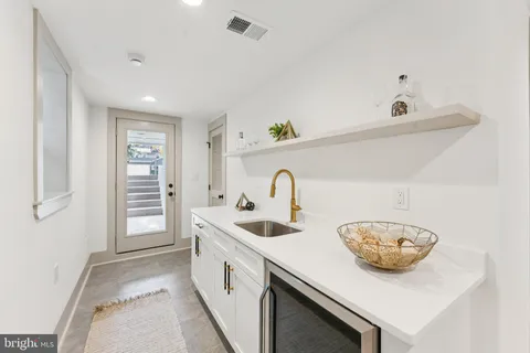 a view of bathroom with dual sinks