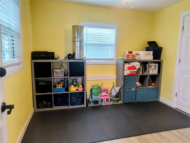 a view of a bedroom from the hallway