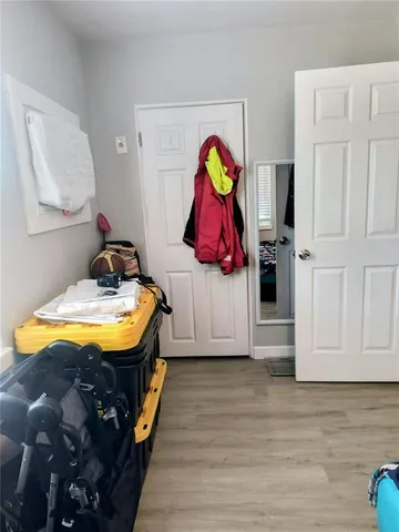 a white toilet sitting next to a bathroom sink