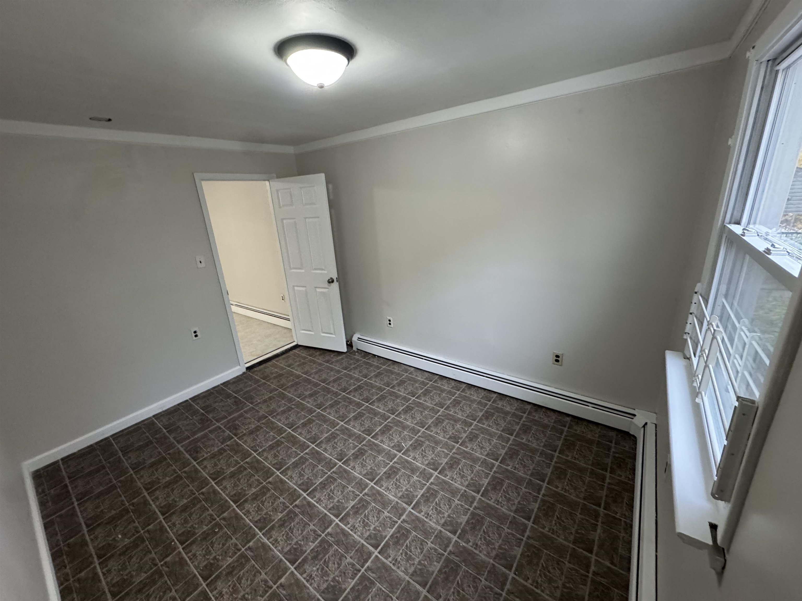 103 Prospect Avenue, Unit 2 Bayonne, NJ 07002 - Photo 11 of 12 a view of empty room